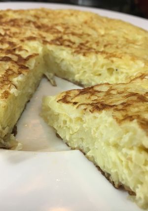 Una foto de Tortilla de papa rallada