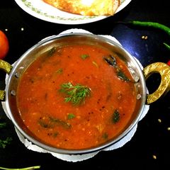 A picture of Tomato and Onion Sambar.