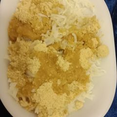 A picture of Jaggery powder rice with desi ghee.