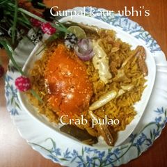 A picture of Crab pulao 🦀🍚.