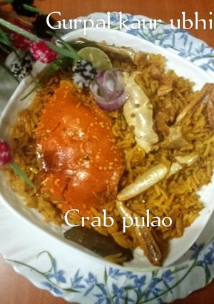 A picture of Crab pulao 🦀🍚.