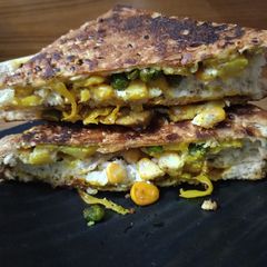 A picture of Leftover Potato veggies cheese sandwich.