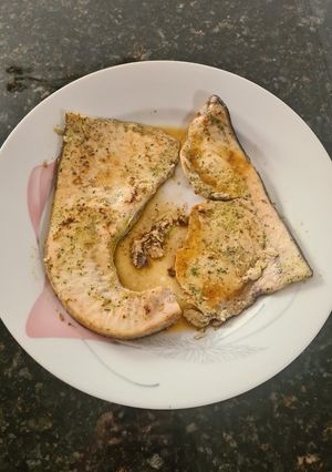 Una foto de 48. Pez Espada con salsa verde