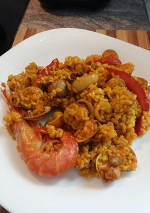 Foto principal de Arroz con berberechos y calamares frescos