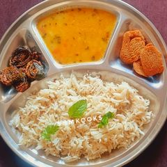 A picture of Panchmel Dal or Panchratna Dal and Jeera Rice.