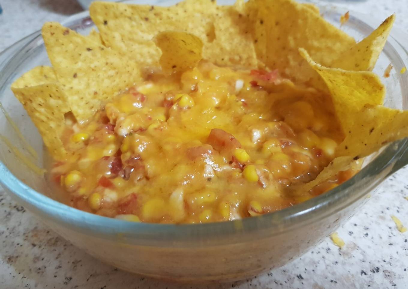 Garlic, Corn, Tomato. Mozzarella topping & Grated Cheese. Salsa