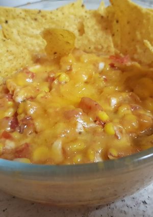A picture of Garlic, Corn, Tomato. Mozzarella topping & Grated Cheese. Salsa.
