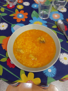 Una foto de Arroz caldoso con pollo