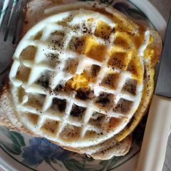A picture of Waffles egg sandwich.