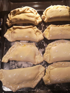 Una foto de Empanadas de pino y jamón queso al horno