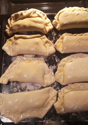 Una foto de Empanadas de pino y jamón queso al horno