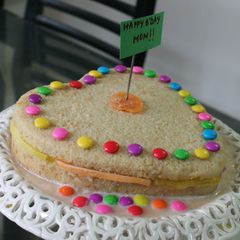 A picture of Simple Layer cake soaked in vanilla sauce with jelly.