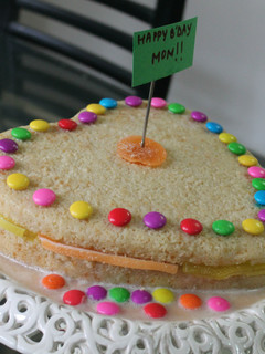 A picture of Simple Layer cake soaked in vanilla sauce with jelly.