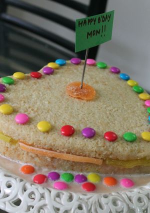 A picture of Simple Layer cake soaked in vanilla sauce with jelly.