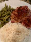Grilled Pork Chop with a Raspberry Chipotle Sauce