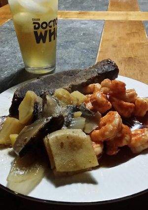 A picture of Brad's whiskey braised tri tip and chili lime prawns.