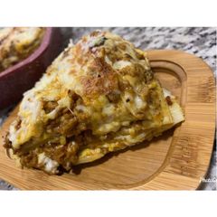 A picture of Mutton Lasagna on stove.