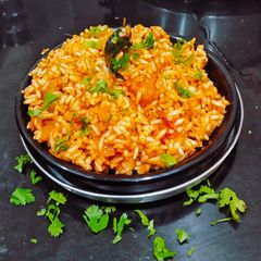 A picture of Maharashtrian Style Tomato Bhhat.