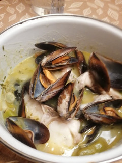 Una foto de 271. Merluza y mejillones en salsa con menestra de verduras