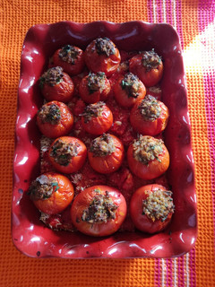 Foto principal de Tomate relleno de carne sobre arroz