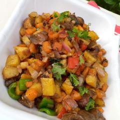 Stir fried potatoes with veggies and gizzard A picture of Stir fried potatoes with veggies and gizzard.