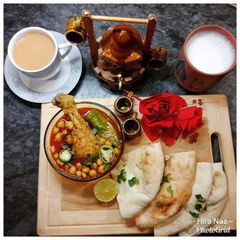 Murgh Cholay With Nan, Meethi Lassi and Tea A picture of Murgh Cholay With Nan, Meethi Lassi and Tea.