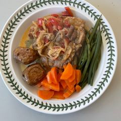 A picture of Pork Chops with creamy cider sauce.