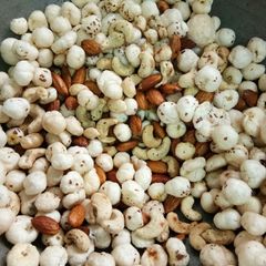 A picture of Roasted Lotus Seeds Cashew nuts and Almonds.