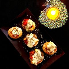A picture of Sev puri Pizza Bites.