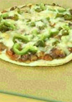 A picture of Yummy rajma pizza.