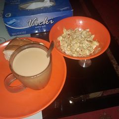 A picture of Scrumble egg with tea nd bread.