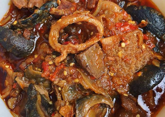 Ofada stew with snail