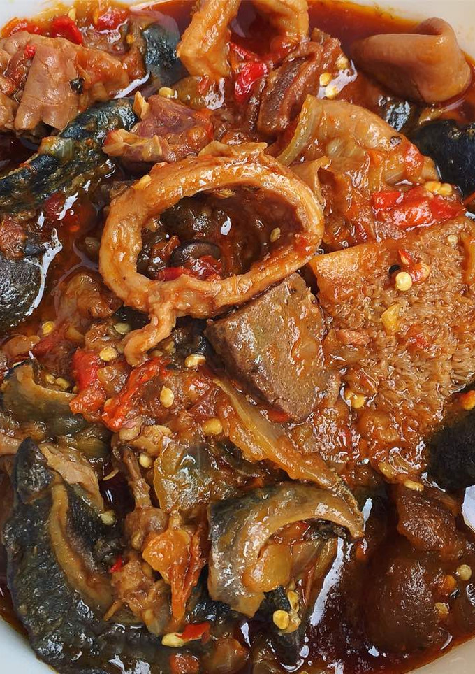 A picture of Ofada stew with snail.