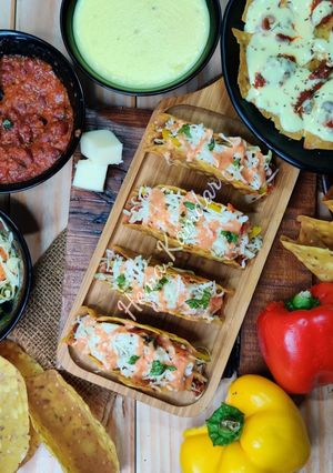 A picture of Baked Tacos and Nachos.
