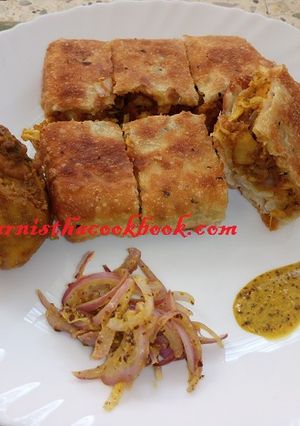 A picture of Mughlai paratha/ Moghlai porota (Chicken minced stuffed).