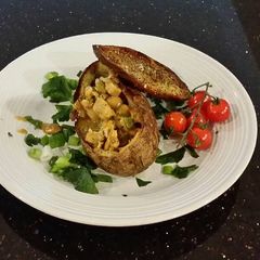 A picture of Chicken Pot Pie in a Crispy Potato Shell.