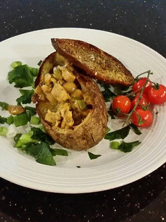A picture of Chicken Pot Pie in a Crispy Potato Shell.