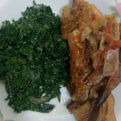 A picture of Wet fried chicken with Kales.