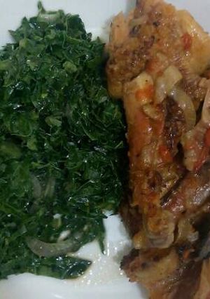 A picture of Wet fried chicken with Kales.