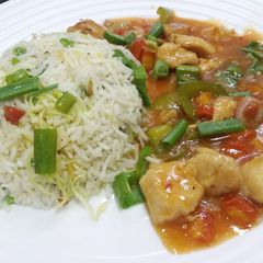 A picture of Chicken Manchurian with Fried Rice.