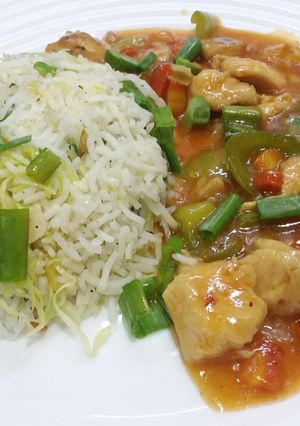 A picture of Chicken Manchurian with Fried Rice.