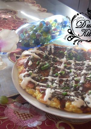 Una foto de Okonomiyaki - Pizza japonesa -