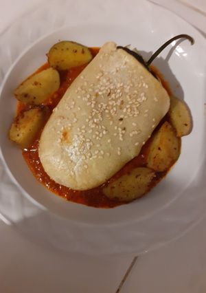 Una foto de Rollo de chile poblano hojaldrado