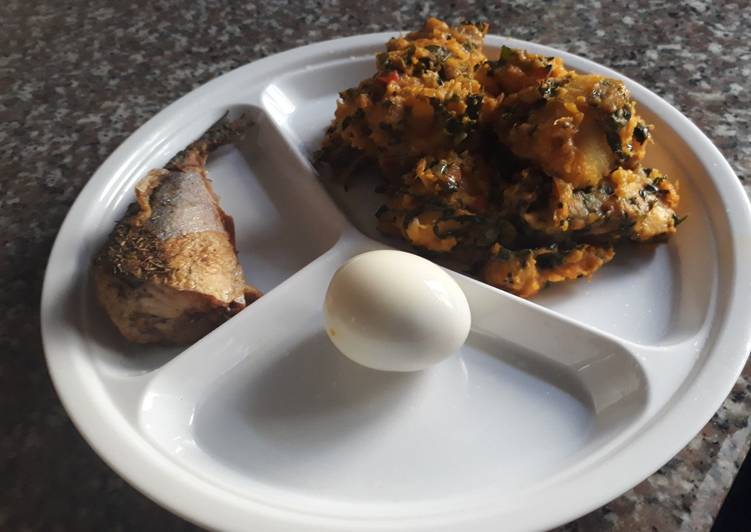 Yam porriage with vegetable,fried fish and boiled egg