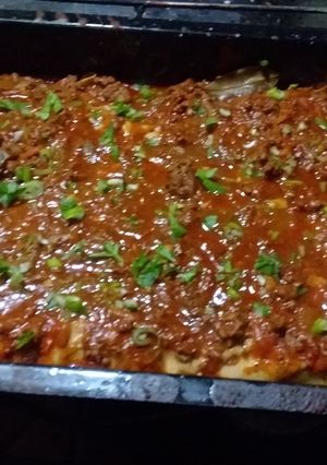 Una foto de Canelones de acelga con salsa blanca y roja