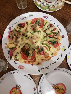 Una foto de Pizzas (2 variedades)