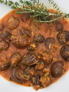Una foto de Caracoles con salsa moruna