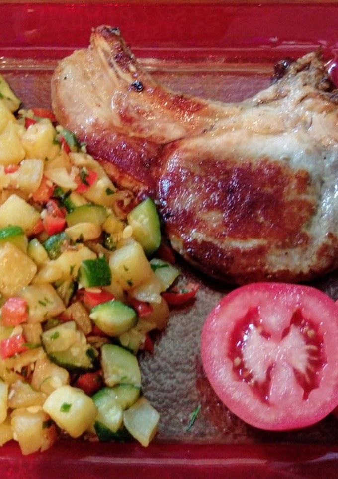 Una foto de Chuletas a la plancha y salteado de verduras