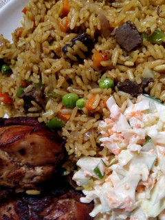 A picture of Jellof rice with vegetables.