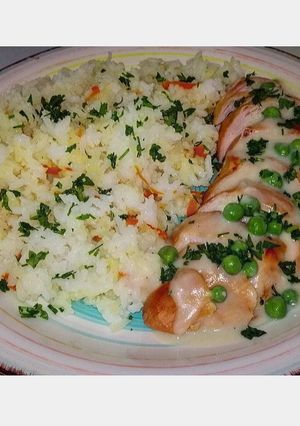 Una foto de Arroz con zanahoria y pollo al horno con salsa bechamel
